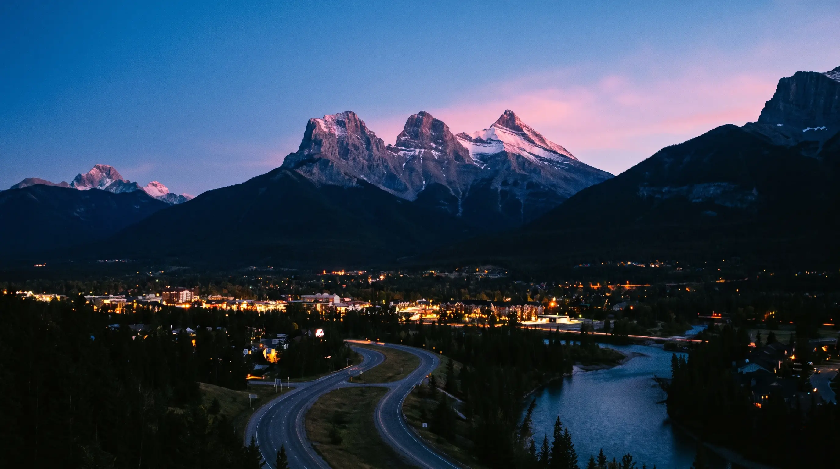 Canmore at dusk beneath the peaks