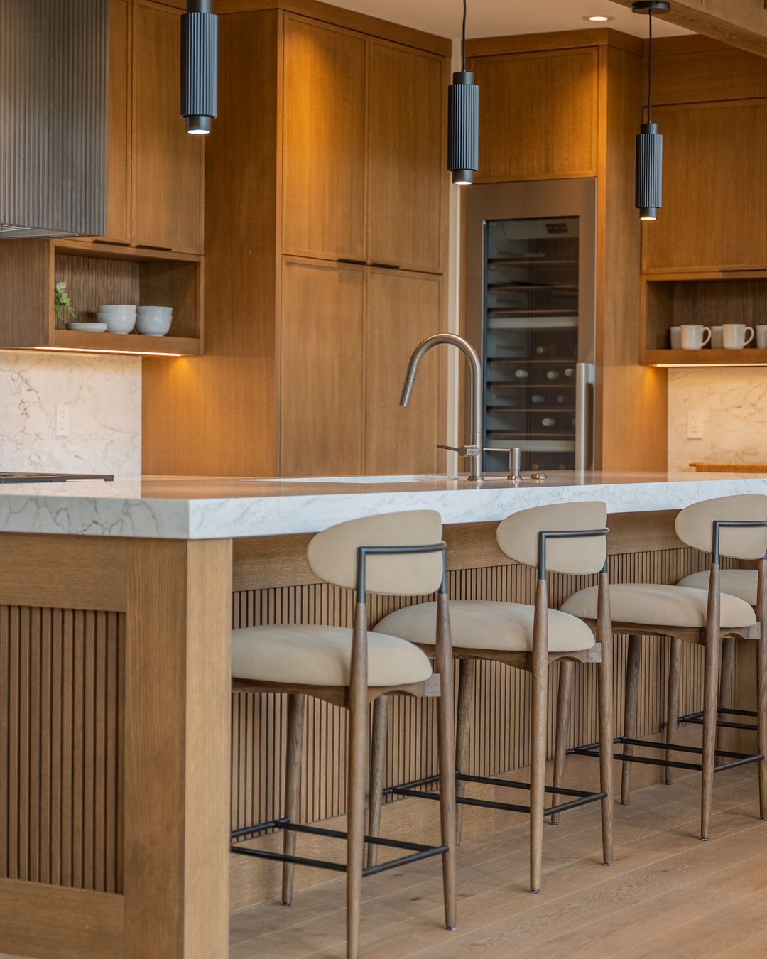 The kitchen island and the stools