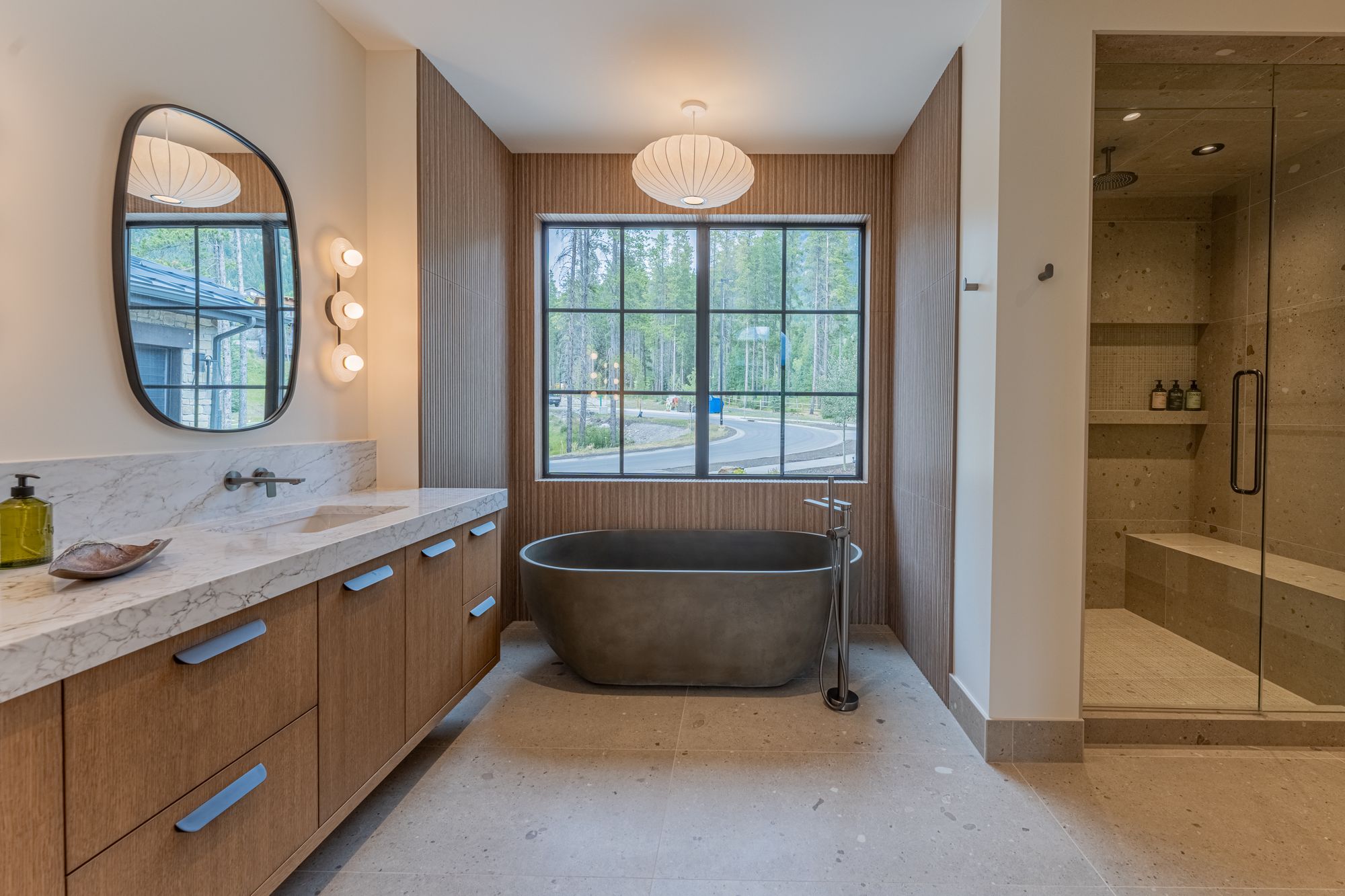 The primary bath, the stone tub under the window