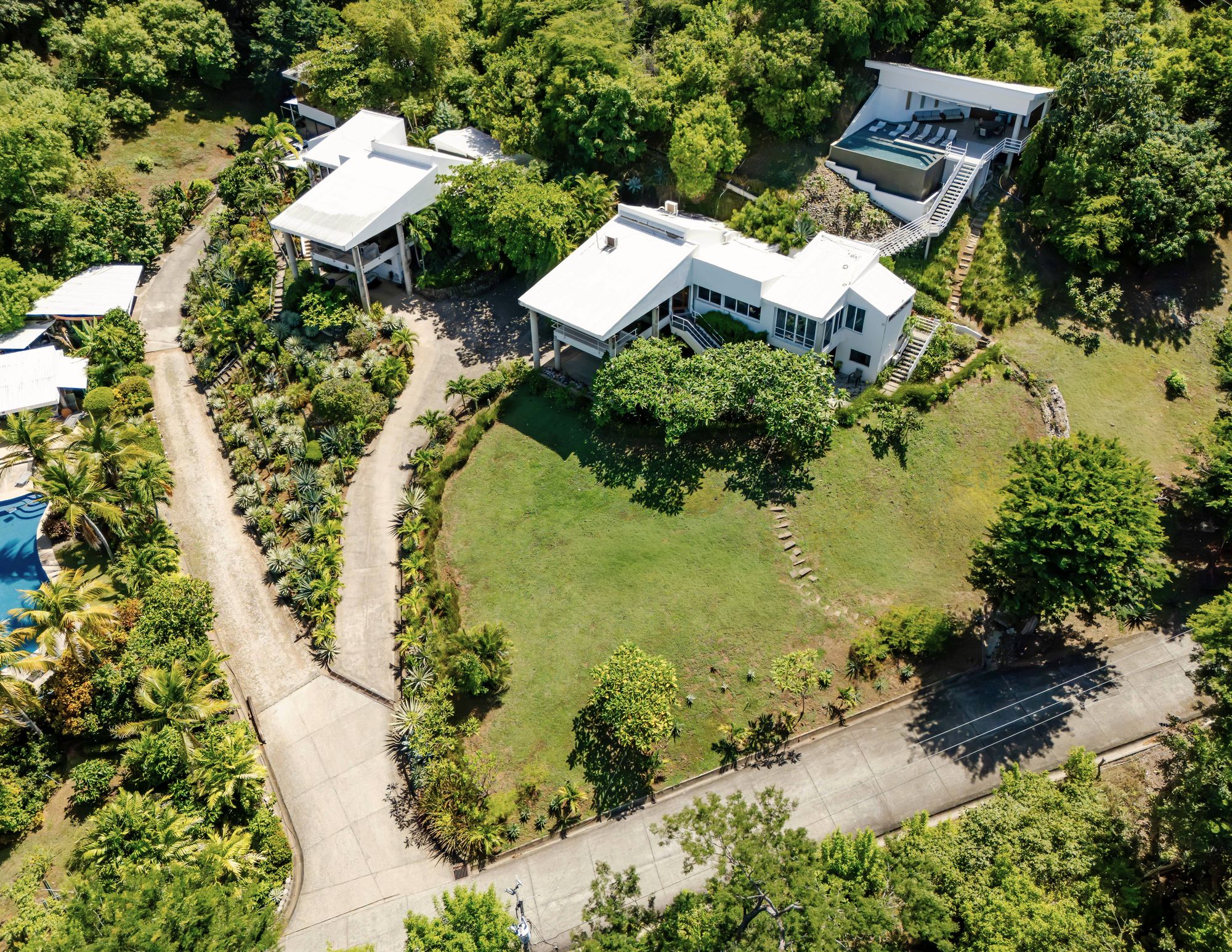 The villa and the pool house from the air